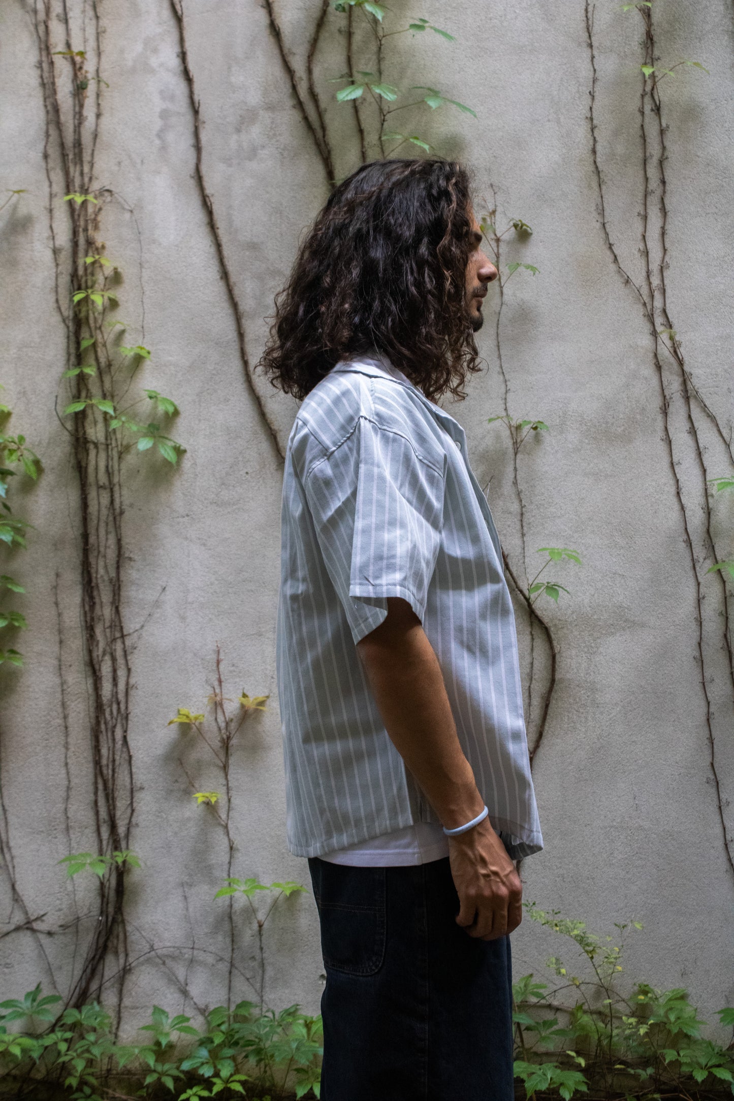 Camisa manga curta às riscas verde