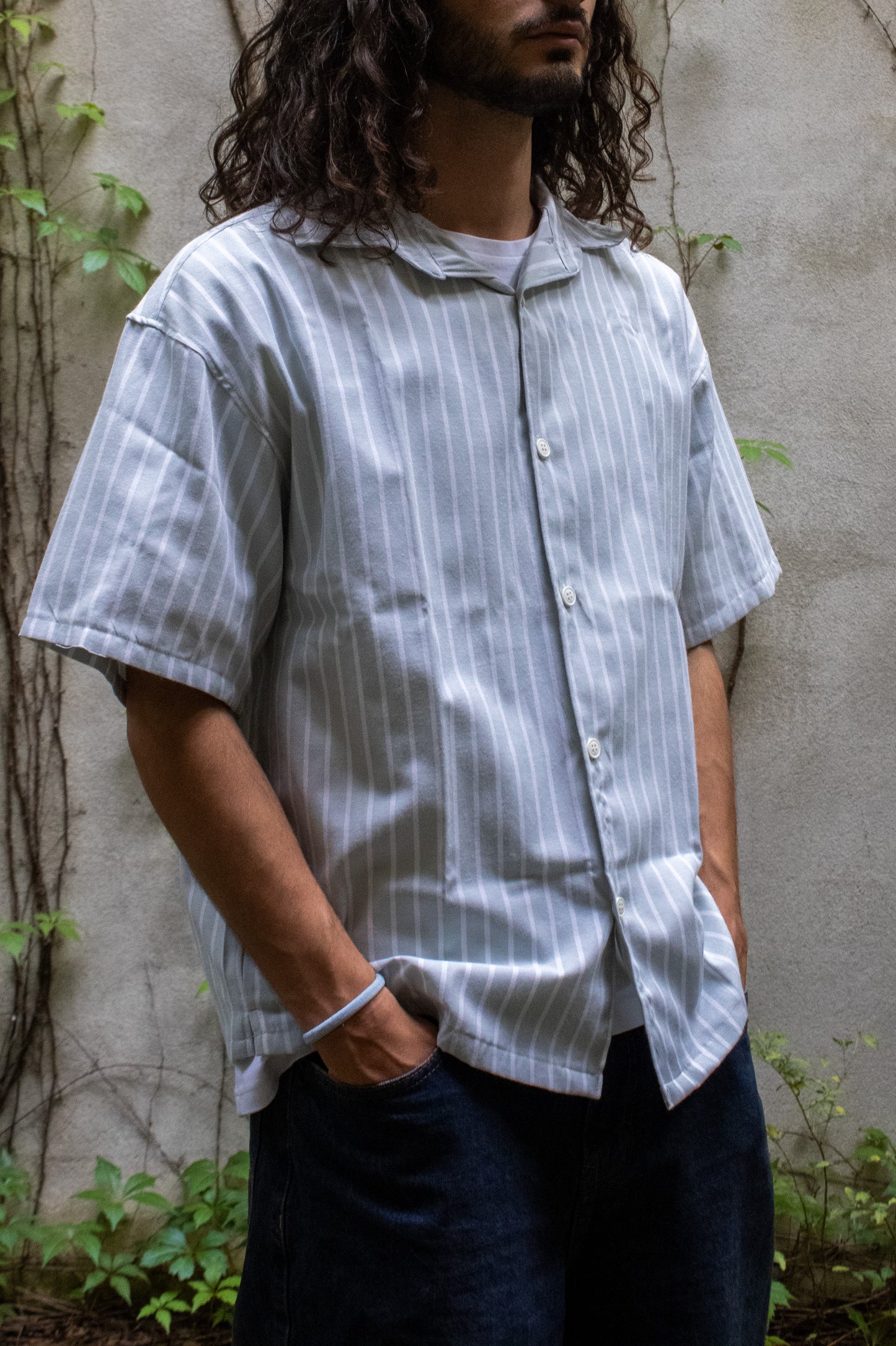 Camisa manga curta às riscas verde